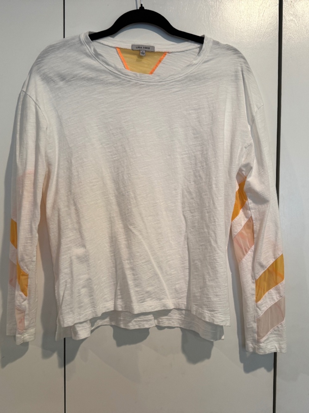 Lisa Todd, White Athletic Shirt, size large.